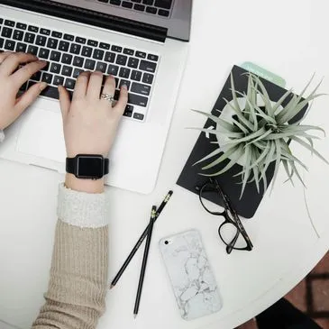 Designer reviewing a garden plan remotely
